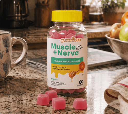 Bee Calm magnesium honey gummies bottle on a kitchen counter