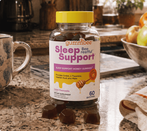 Bee Restful sleep honey gummies bottle on a kitchen counter