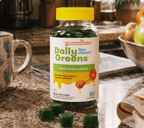 Bee Vibrant greens honey gummies bottle on a kitchen counter